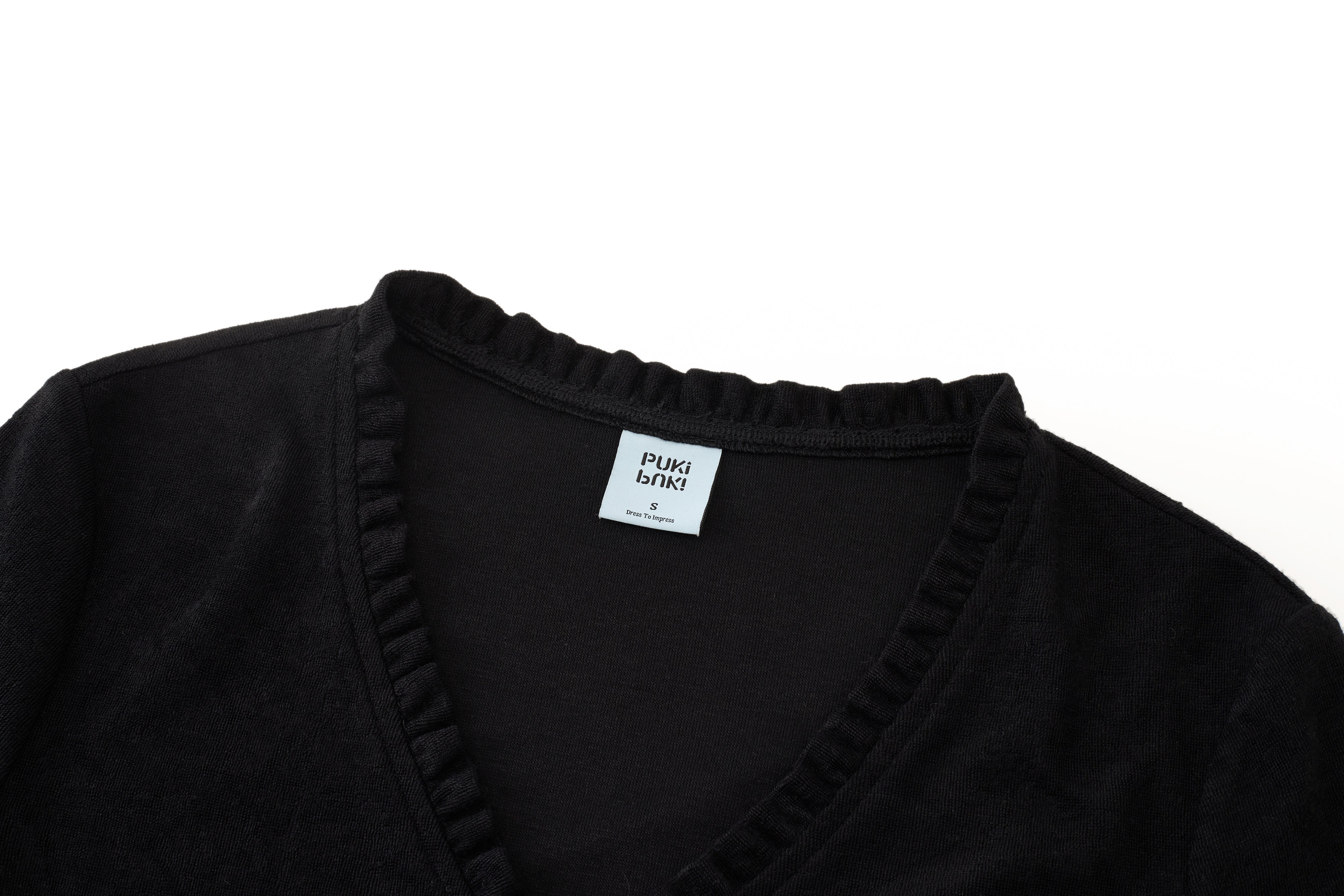 เซ็ตเสื้อถักลาย scallop และกระโปรงติดโบว์