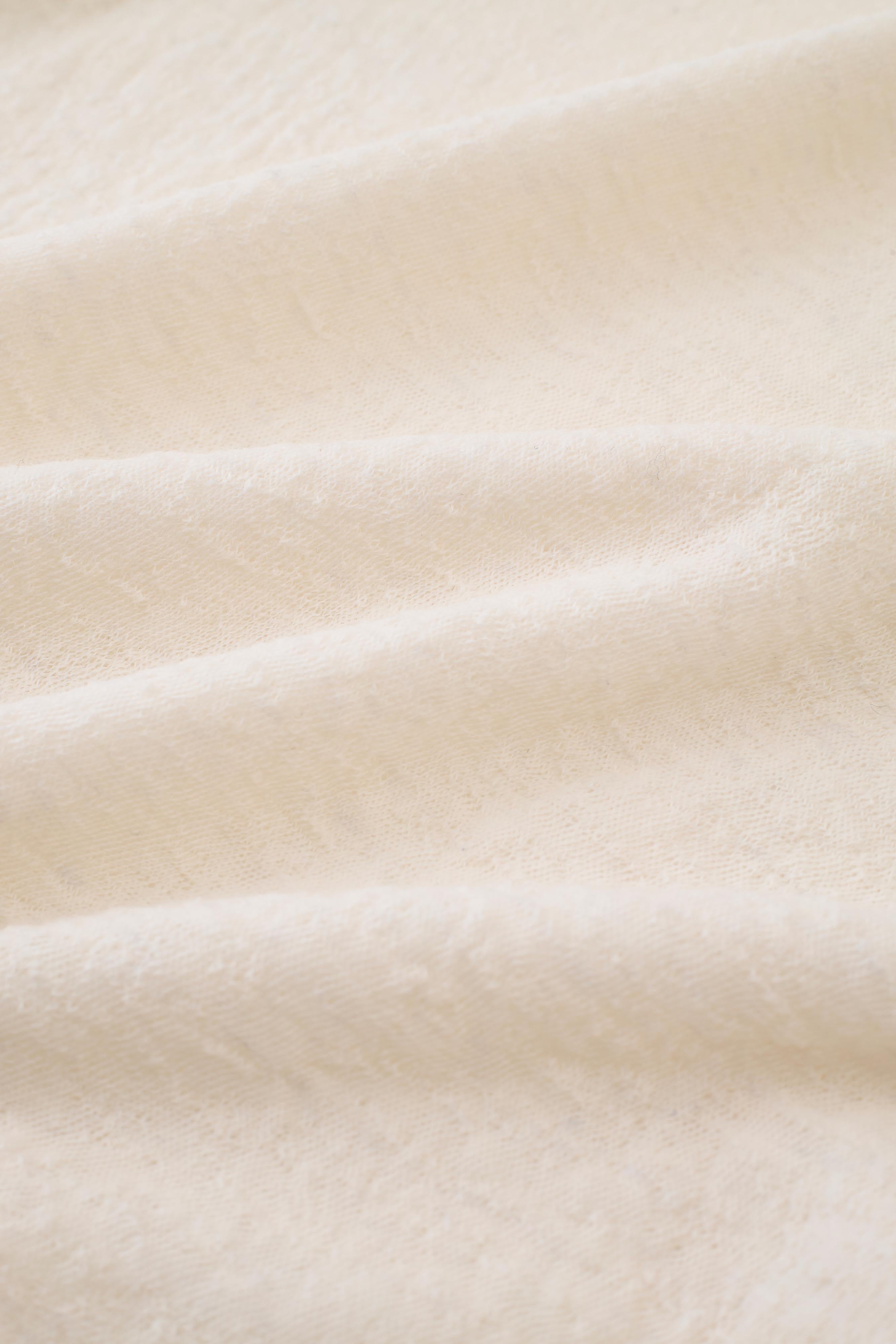 เสื้อจับจีบผ้าขนสัตว์ลาย Jacquard